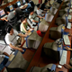 Chinese youth use computers at an Internet cafe in Beijing Saturday June 18, 2005. China has the world's second-largest online population - 100 million - after the United States, but addiction to the Internet is increasing. The country's first government-approved clinic geared toward curing Internet addicts, has treated more than 300 addicts since opening last October. (AP Photo/Greg Baker)
